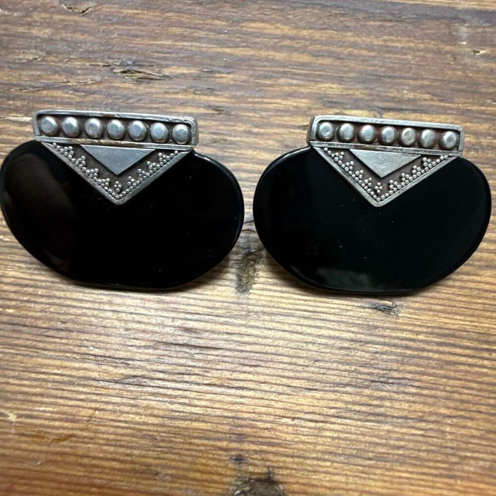architectural Southwestern-style sterling silver earrings featuring a dramatic b